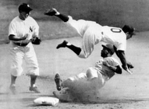 Jackie Robinson sliding into second during the 1947 World Series with ...