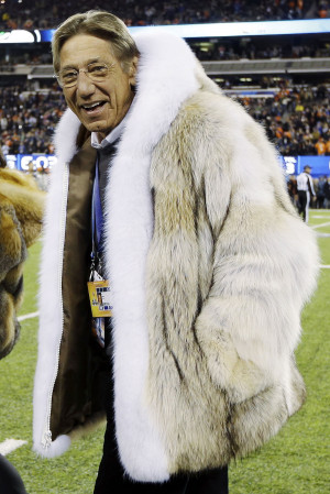 ... QB Joe Namath walks on the field before the NFL Super Bowl XLVIII