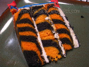 Tiger Cake Slice by gemcitykitty, via Flickr. Maybe shark decorations ...