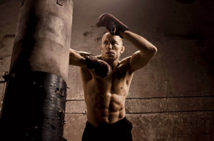 ... , shows off his rock-hard abs while training for an important fight
