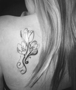 tulip tattoo. Like this w/ each of the kids initials in each flower.