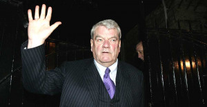 David Irving, giving a half-assed Hitler salute.