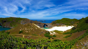 Sea cave and coral sand beach of South Iwo Jima Island (Minami-Iōtō ...