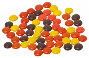 reese s pieces are small crispy candies surrounding a peanut butter ...