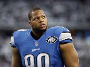 Detroit Lions defensive tackle Ndamukong Suh (90) warms up before an ...
