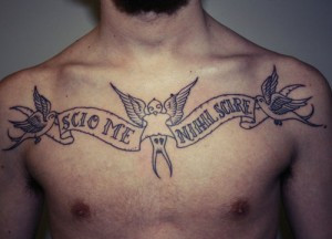 Latin Live Quote And Banner Tattoos On Chest