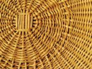 Interwoven strips of wicker.