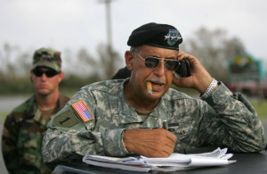 In a photo from 2005, Lt. Gen. Russel Honoré talks on a cell phone in ...