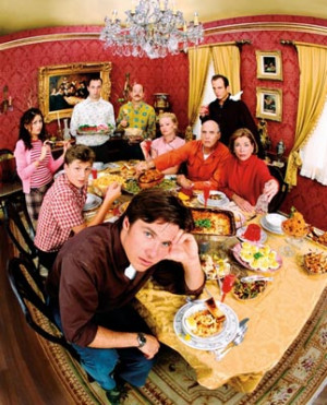 Michael Bluth looking exasperated with his family at the dinner table