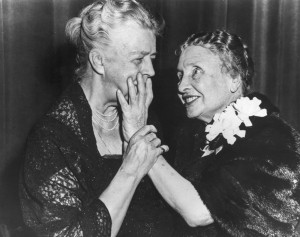 ... her left hand to touch Eleanor Roosevelt's face while Roosevelt