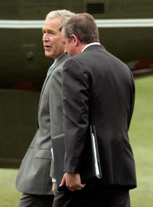 Ed Gillespie U S President George W Bush L is joined by White