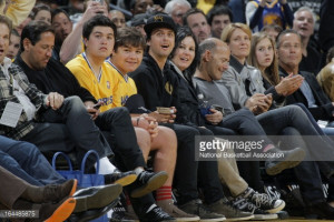 Billie Joe Armstrong watches a game between the Washington Wizards and ...