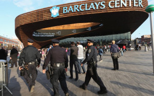 New York City police officers patrol outside the Barclays Center prior ...