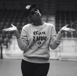 Her sweater seems to pay homage to Jay-Z’s “Can I Live” track ...