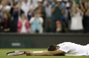 Lukas Rosol of the Czech Republic reacts after defeating Rafael Nadal ...