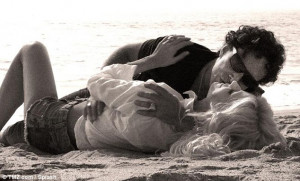 ... Sahali and seen kissing on the beach in a new music video for his band