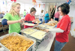 volunteers bring thanksgiving food fellowship to flood ravaged west
