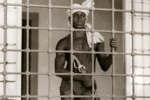 eunuch carrying a weapon keeps an eye on a harem in Tunis, Tunisia ...