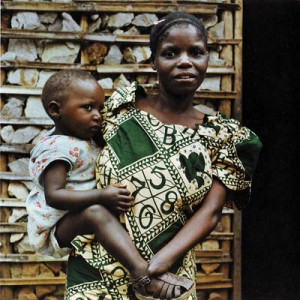 Jeannette with her baby. Her hands were cut off by rapists. © 2006 ...