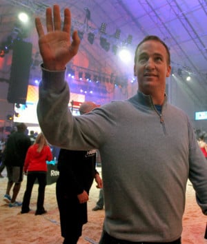 Indianapolis Colts quarterback Peyton Manning waves to the crowd as he ...