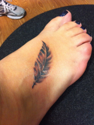 feather tattoo by catieisavampire159