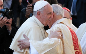 Pope Francis embraces a concelebrant at the Mass of thanksgiving for ...