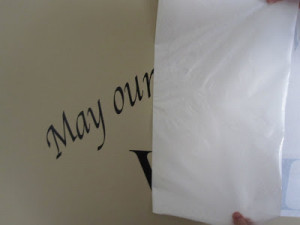 Peeling back the paper to reveal our new letters!