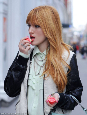 touches up her lips with EOS Smooth Sphere Lip Balm Pale Green, Eos ...