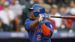 New York Mets' Juan Uribe follows the flight of his solo home run off ...