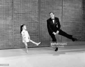 ... Photo: American entertainer Gene Kelly dances with Cherylene Lee