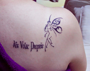 It's a fairy with the Latin phrase, 