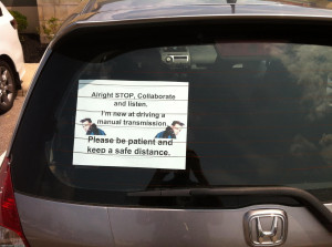 GF is learning to drive a manual transmission. This sign warns other ...