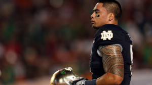 Manti Te'o of the Notre Dame Fighting Irish warms up prior to playing ...