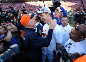 Jan 19, 2014; Denver, CO, USA; Denver Broncos head coach John Fox and ...