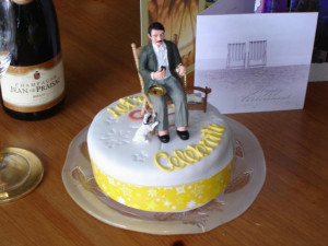 Picture of Retirement Cake w/ a man + a dog as topper