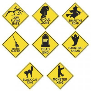 Signs have sayings such as 'Low Flying Bats', 'Ghoul Zone', 'Dead End ...