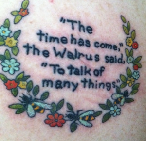 Quote from Alice in Wonderland on my left shoulder blade. Done at ...