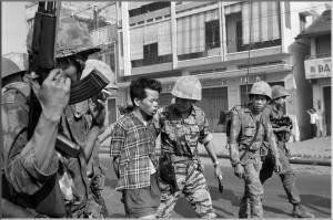 BEFORE: South Vietnamese forces escort suspected Viet Cong officer ...