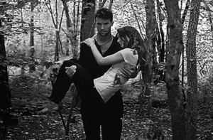 Daemon Black pov]Kat seemed incredibly small and delicate in my arms ...