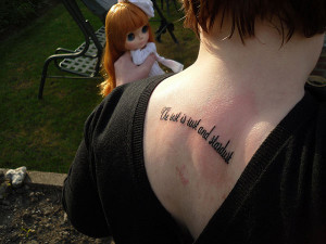 Girl with doll Best tattoo quotes