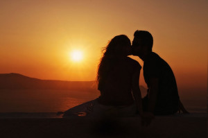 Greek lovers, Sun kiss. Firostefani, Santorini, Greece