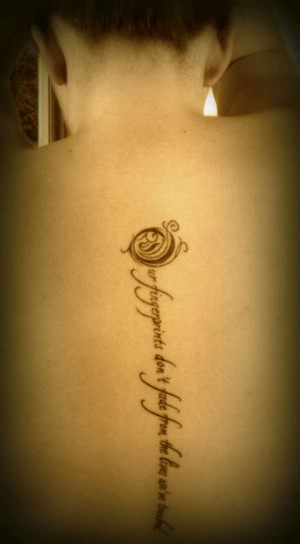 spine quote tattoo