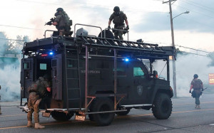 Ferguson highlights the rise of police militarization where peaceful ...