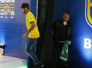 national soccer team player Neymar (L) arrives with his father, Neymar ...