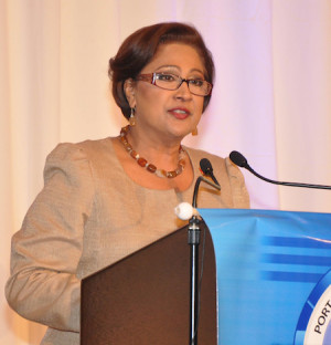 Prime Minister Kamla Persad-Bissessar in response to a reporter's ...