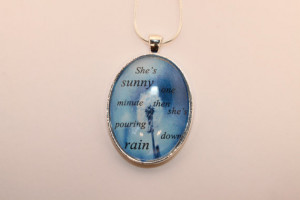 She's sunny one minute then pouring down rain - Quote Pendant Necklace ...
