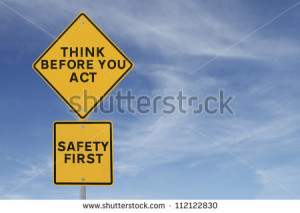 road sign indicating a safety quote or saying (against a blue sky ...