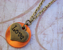 GREATEST IS LOVE - Antique Gold Lov e Heart and Orange Disc Necklace ...
