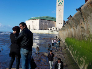 Pooling waters of the Atlantic Ocean draw locals to a seawall by the ...