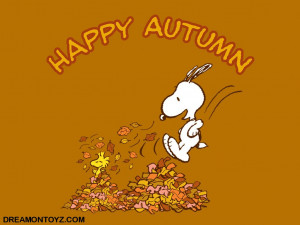 Happy Autumn - Woodstock and Snoopy playing in a pile of leaves